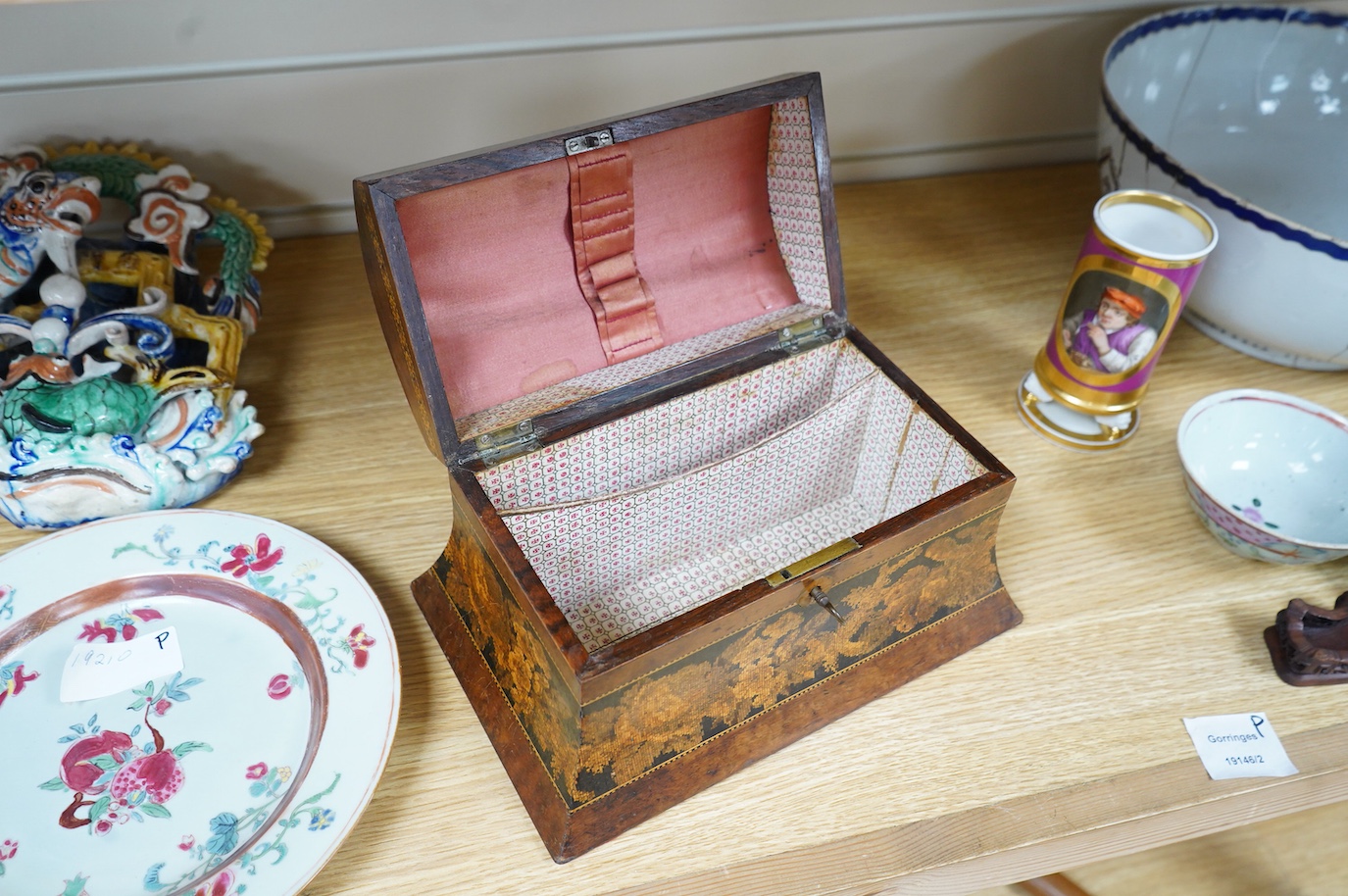 A Tunbridgeware box of domed form, with a scene of an Abbey ruins, 25cm wide